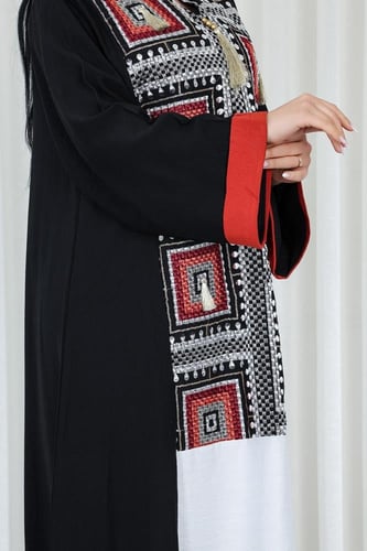 جلابية قماش بطول يصل للكاحل وياقة صغيرة مفتوحة على...