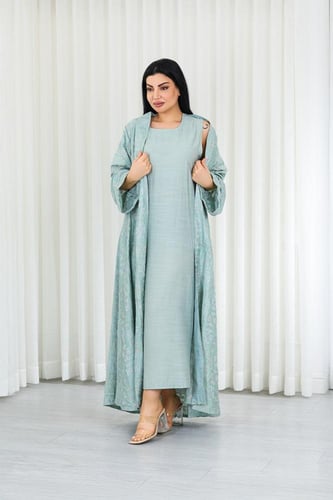 جلابية قماش بطول يصل للكاحل مكونة من قطعة سادة وقط...