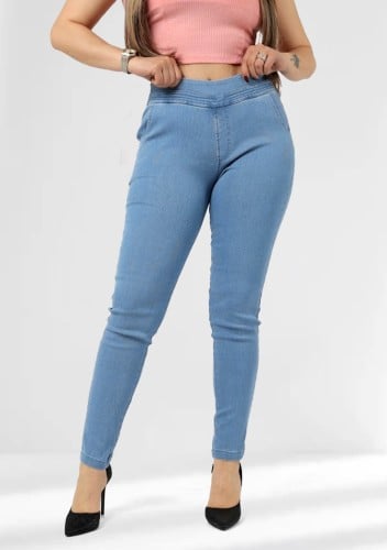 بنطال جينز خصر متوسط مطاطي وقصة ضيقة حتى الكاحل