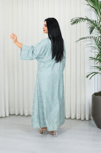 جلابية قماش بطول يصل للكاحل بأكمام واسعة مطوية متو...
