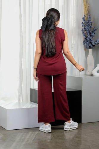 طقم نسائي كاجوال سادة توب طويل بدون أكمام