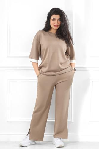 ترنج نسائي كاجوال سادة بنهايات أكمام باللون الأبيض...