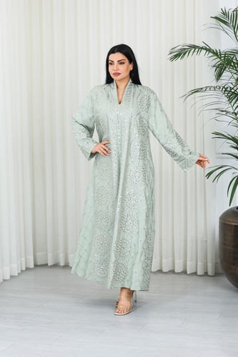 جلابية قماش بطول يصل للكاحل بأكمام بنهايات واسعة و...