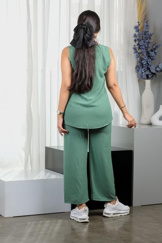 طقم نسائي كاجوال سادة توب طويل بدون أكمام