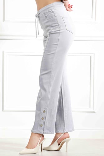 بنطال جينز خصر متوسط برباط مطاطي بقصة واسعة حتى ال...