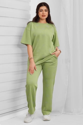 ترنج نسائي كاجوال مزين بطبعات متكررة على التيشرت و...