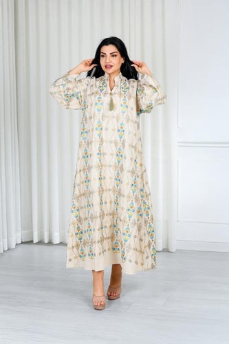 جلابية قماش بطول يصل للكاحل ونهايات أكمام واسعة وي...