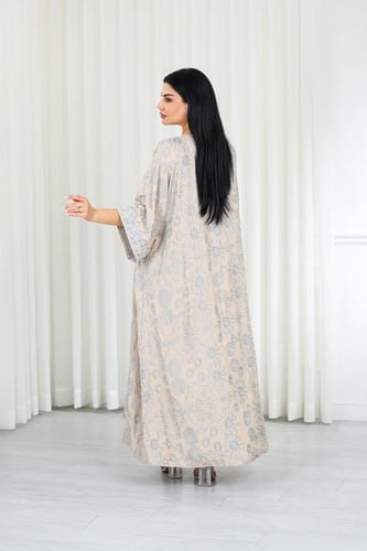 جلابية قماش بطول يصل للكاحل وياقة بشكل V مفتوحة عل...