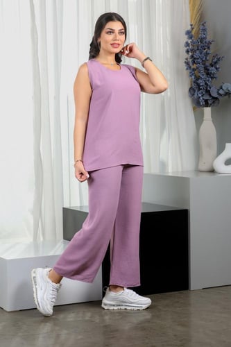 طقم نسائي كاجوال سادة توب طويل بدون أكمام