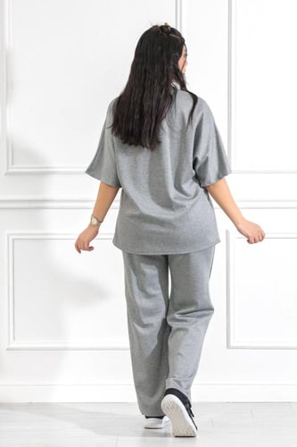 ترنج نسائي كاجوال بأكمام متوسطة الطول مزين بخط أبي...