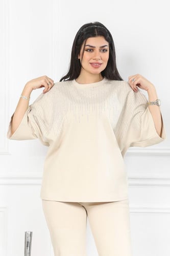 ترنج نسائي كاجوال مزين بالترتر على الصدر والأكمام...