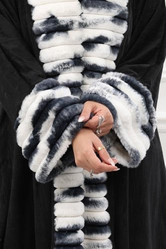 فروة شتوية طويلة أنيقة مبطنة بالفرو من الداخل وعلى...