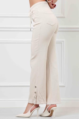 بنطال جينز خصر متوسط برباط مطاطي بقصة واسعة حتى ال...