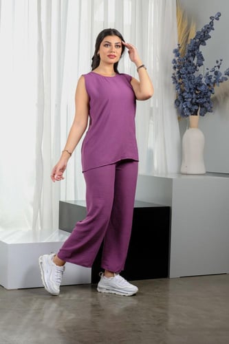 طقم نسائي كاجوال سادة توب طويل بدون أكمام