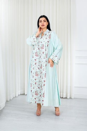 جلابية قماش بطول يصل للكاحل بياقة قصيرة مطرزة بالو...