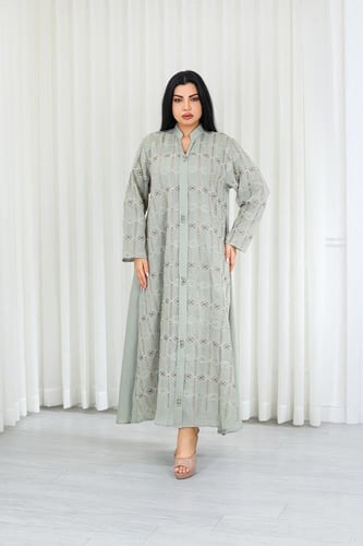 جلابية قماش بطول يصل للكاحل وياقة صغيرة مفتوحة على...