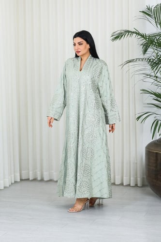 جلابية قماش بطول يصل للكاحل بأكمام بنهايات واسعة و...