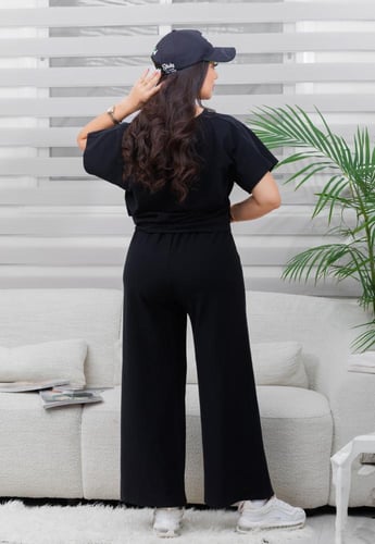 طقم نسائي كاجوال سادة توب نص كم مزين بربطة أمامية...