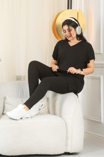 ترنج نسائي كاجوال ريب سادة تيشرت طويل وياقة V وبنط...