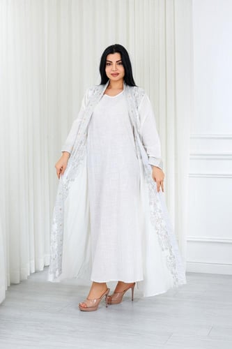 جلابية قماش بطول يصل للكاحل مكونة من قطعة سادة وقط...