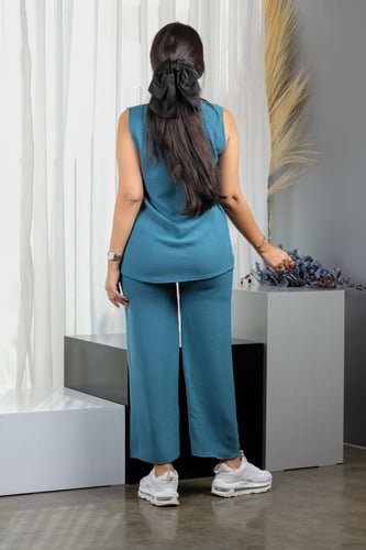 طقم نسائي كاجوال سادة توب طويل بدون أكمام