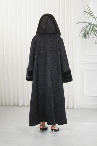 فروة شتوية طويلة مبطنة بالفرو من الداخل مزودة بقبع...