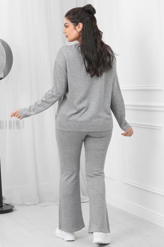 ترنج شتوي كاجوال بطبعة أنيقة وبنطال واسع من الأسفل