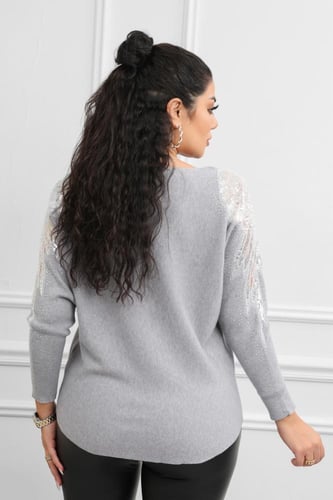 بلوزة نسائية صوف بأكمام طويلة بتفريغ وزخرفة ترتر