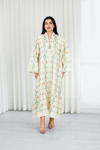 جلابية قماش بطول يصل للكاحل ونهايات أكمام واسعة وي...