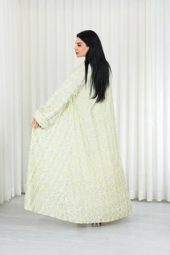 جلابية قماش بطول يصل للكاحل مكونة من قطعة سادة وقط...