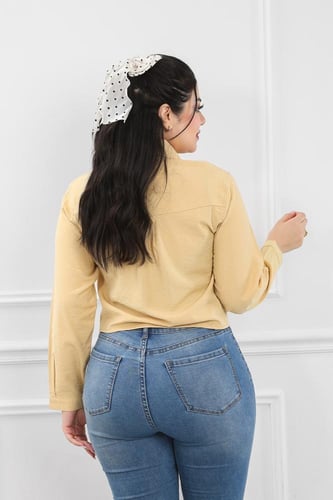 قميص نسائي بأكمام طويلة وطول للخصر بأزراز ملونة