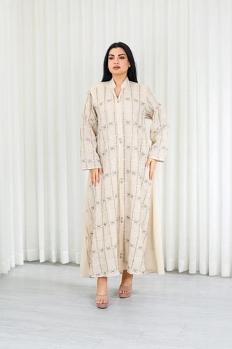 جلابية قماش بطول يصل للكاحل وياقة صغيرة مفتوحة على...