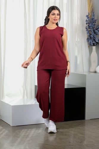 طقم نسائي كاجوال سادة توب طويل بدون أكمام