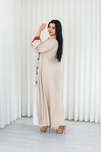 جلابية قماش بطول يصل للكاحل وياقة صغيرة مفتوحة على...