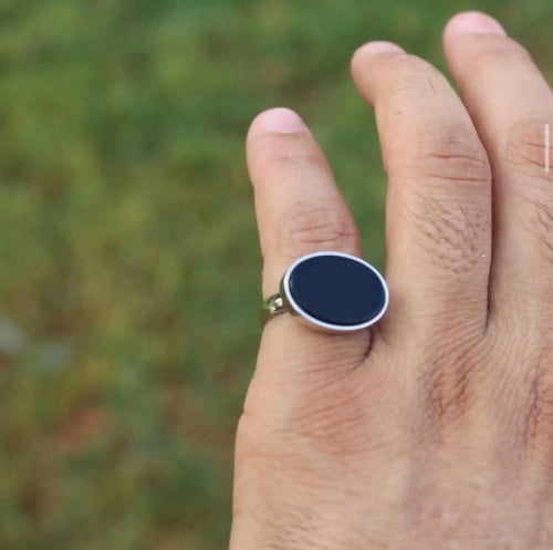 خاتم فضة رجالي عيار 925 مرصع بحجر ملكي كحلي بيضاوي...