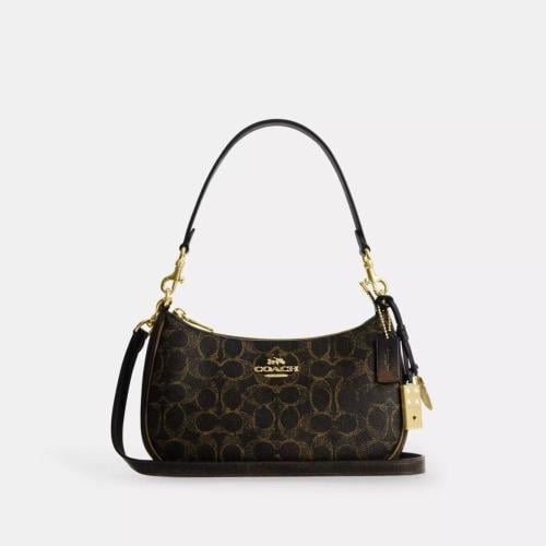 حقيبة كوتش تيري كتف سيغنتشر كانفاس لوفد مع تعليقات...