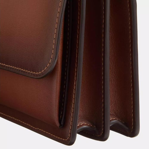 حقيبة كوتش كلير ميني كروس بودي احمر خشبي تصل خلال...