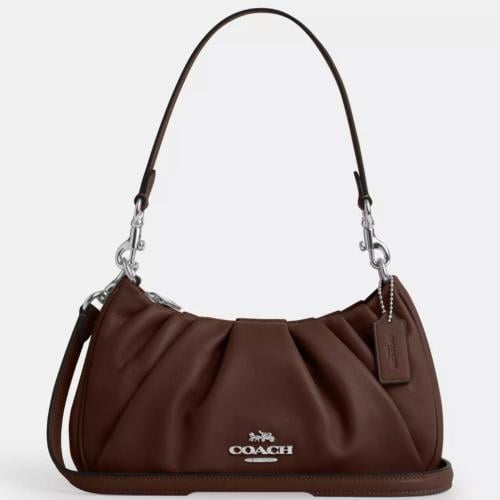 حقيبة كوتش تيري شولدر بكسرات فوري