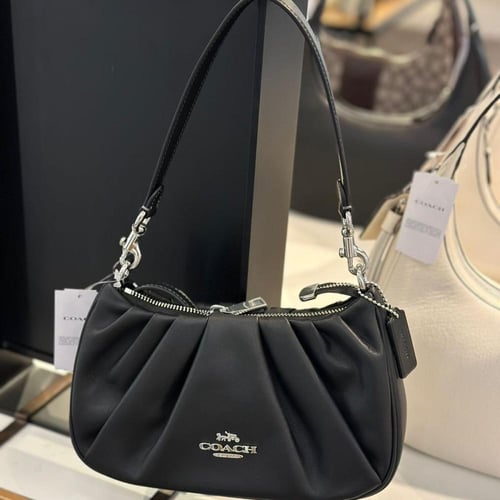 حقيبة كوتش تيري شولدر بكسرات فوري