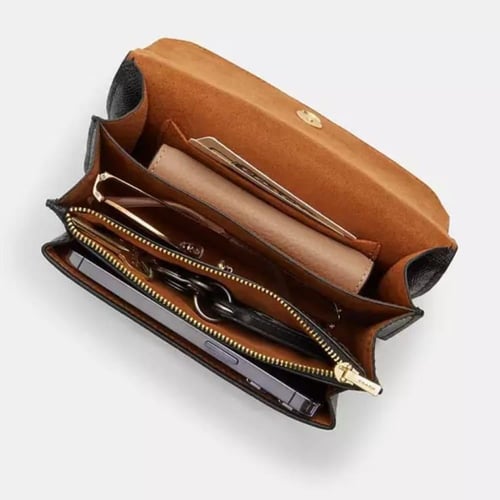 حقيبة كوتش ميني كلير لماع اسود فوري