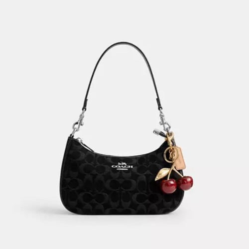 شنطة كوتش كتف تيري سيغنتشر دنيم تصل خلال ٢-٤ أسابي...