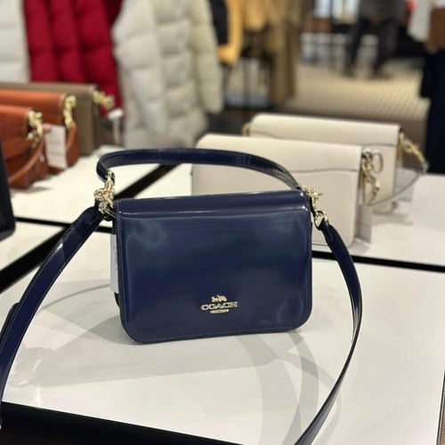 حقيبة كوتش كوين فوري