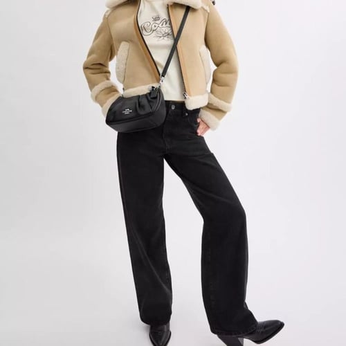 حقيبة كوتش تيري شولدر بكسرات فوري