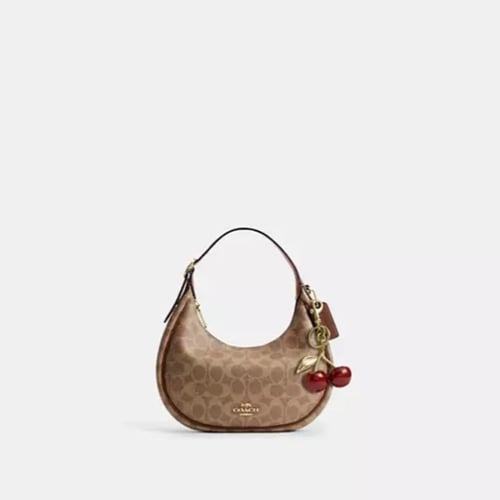 حقيبة كوتش إيميلي كتف سيغنتشر كانفاس تان تصل خلال...