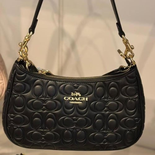 حقيبة كوتش تيري شولدر محفر فوري