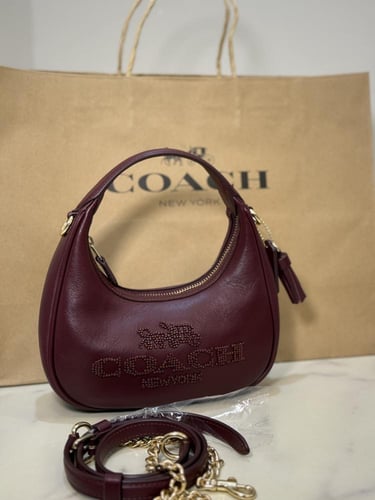 حقيبة كوتش ميني كارمن عنابي فوري