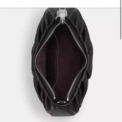 حقيبة كوتش تيري شولدر بكسرات فوري