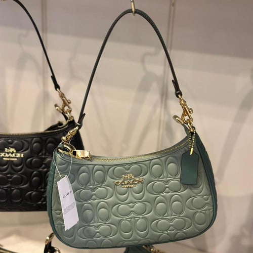 حقيبة كوتش تيري شولدر محفر فوري