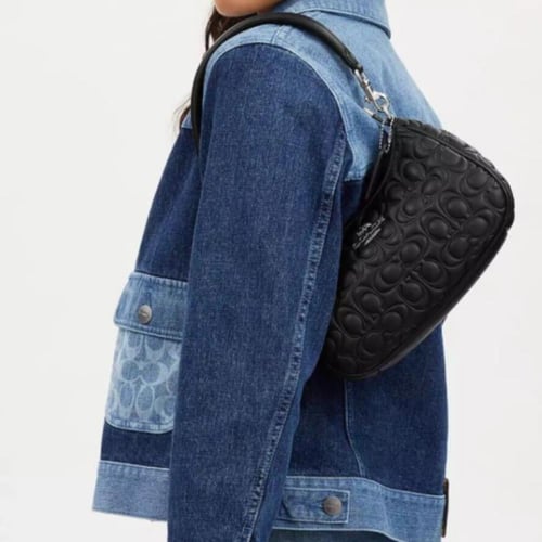 حقيبة كوتش تيري شولدر محفر فوري