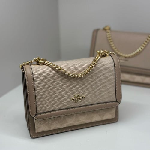 حقيبة كوتش ميني كلير قماش/جلد فوري